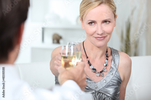 Photo: Couple toasting with champagne Couple toasting with champagne