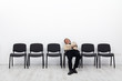 Tired businessman waiting