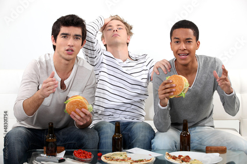 Photo: Lads watching television Lads watching television