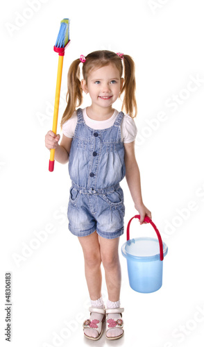 Photo: Cute little girl with mop and bucket is ready to clean Cute little girl with mop and bucket is ready to clean