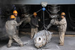 Workers in the iron and steel enterprise production line