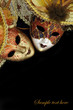 Vintage carnival masks on black background with copy-space