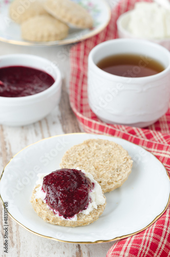Photo: Scone with goat cheese and jam for breakfast Scone with goat cheese and jam for breakfast