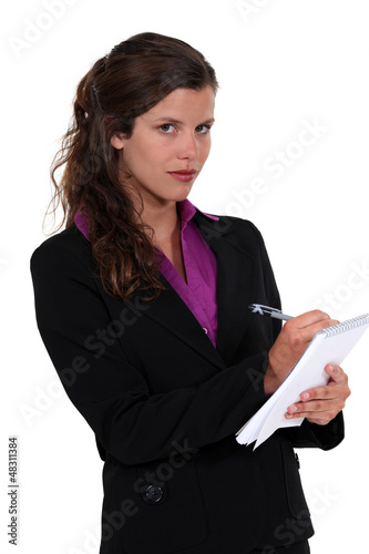 Photo: businesswoman taking notes businesswoman taking notes