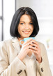 lovely businesswoman with mug