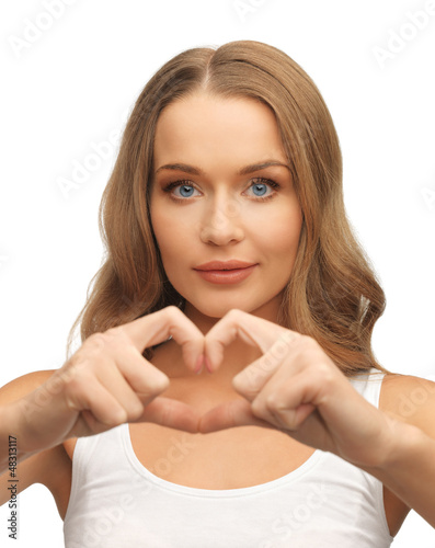 Photo: woman forming heart shape woman forming heart shape