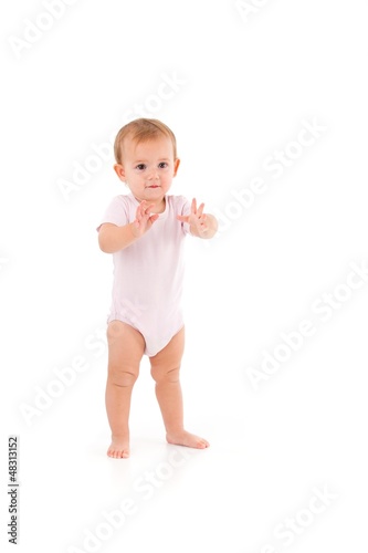 Photo: Cute baby standing unstable Cute baby standing unstable