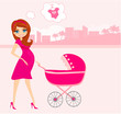 beautiful pregnant woman pushing a stroller