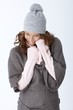 Happy woman laughing in winter outfit