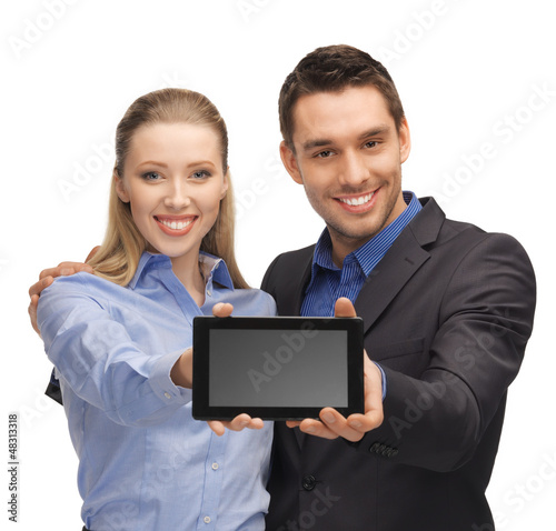 Photo: man and woman with tablet pc man and woman with tablet pc