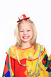 kleines Mädchen als lachender Clown