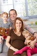 Portrait of happy family with two daughters