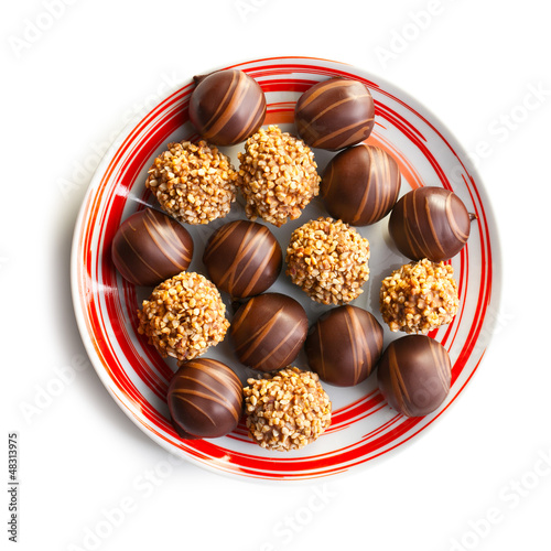 Photo: chocolate pralines in plate chocolate pralines in plate