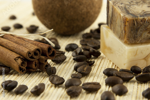 Photo: spa composition with natural soap and cinnamon sticks spa composition with natural soap and cinnamon sticks