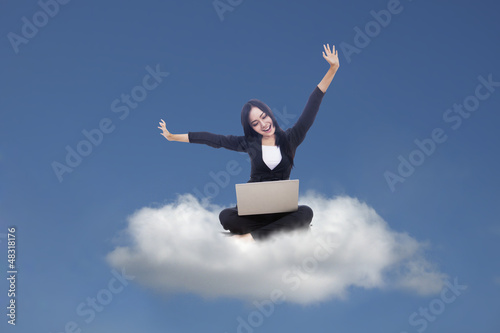 Photo: Businesswoman and cloud computing Businesswoman and cloud computing