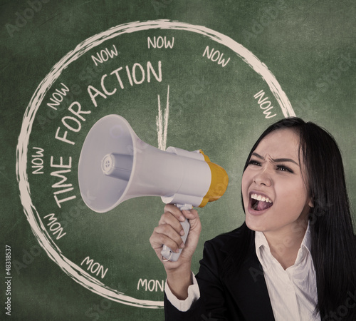 Photo: Businesswoman scream using speaker Businesswoman scream using speaker