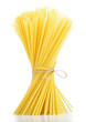 Photo: Linguine pasta tied with old rope isolated on white background Linguine pasta tied with old rope isolated on white background