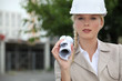 Young architect stood with role