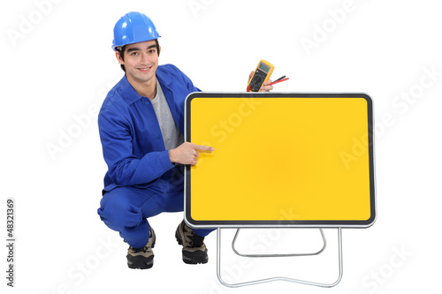 Photo: An electrician An electrician