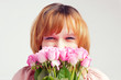 The beautiful young woman with union of roses