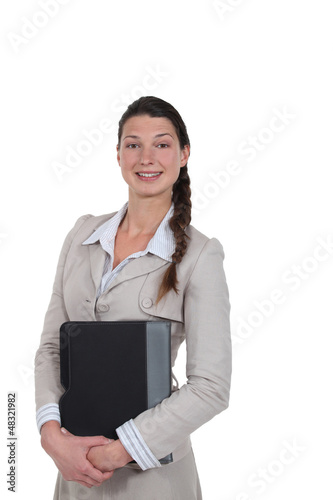 Photo: Stylish woman holding a folder Stylish woman holding a folder