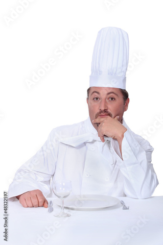 Photo: Cook waiting to be served Cook waiting to be served