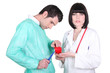 Doctors performing open heart surgery