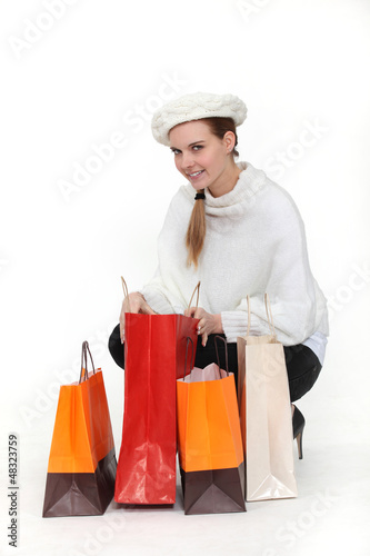 Photo: A woman shopping. A woman shopping.