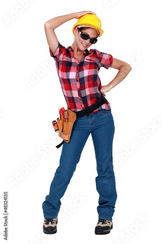 Photo: A sexy female construction worker. A sexy female construction worker.