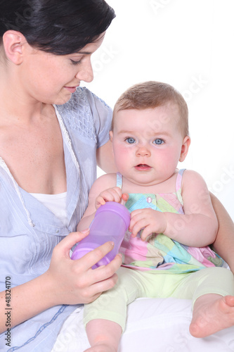 Photo: Mother feeding baby Mother feeding baby