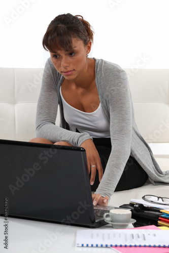 Photo: Woman working from home Woman working from home
