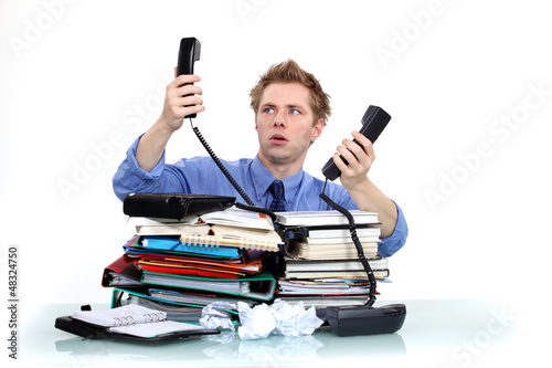 Photo: Men overwhelmed at work Men overwhelmed at work