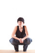 boy in a black T-shirt and a black hat