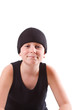 boy in a black T-shirt and a black hat