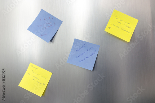 Photo: Reminder sticky notes with handwritten text Reminder sticky notes with handwritten text