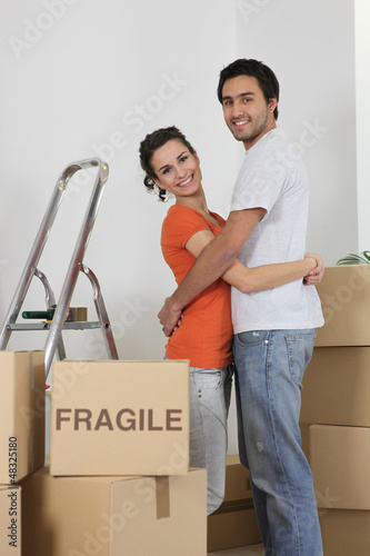 Photo: Couple packed for big move Couple packed for big move