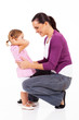 happy mom and little girl on white