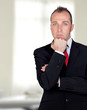 Photo: Pensive businessman in the office Pensive businessman in the office