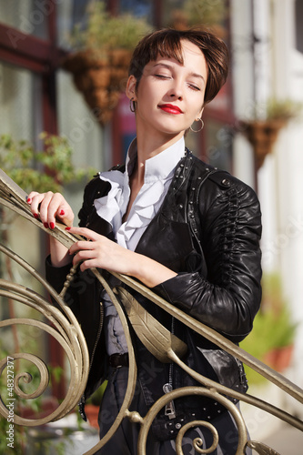 Photo: Young woman daydreaming Young woman daydreaming