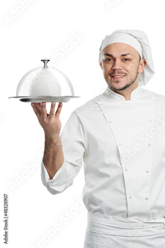 Photo: positive chef with cloche lid cover isolated positive chef with cloche lid cover isolated
