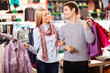 Couple in clothes department