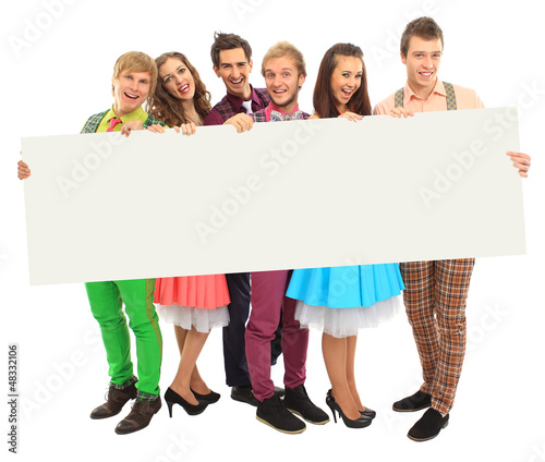 Photo: Group of happy people with banner Group of happy people with banner