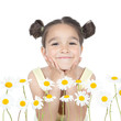 Little girl with daisies on white