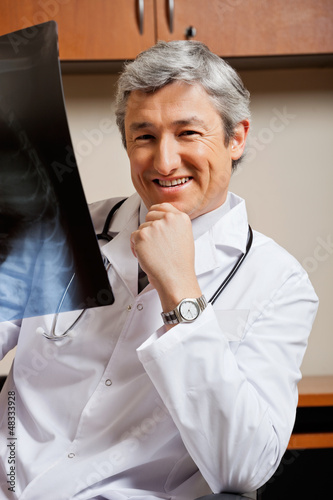 Photo: Happy Radiologist With X-ray Happy Radiologist With X-ray