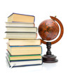 books and vintage globe on white background