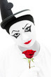 Photo: Sad clown with red rose Sad clown with red rose