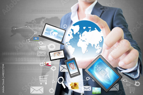 Photo: World Technology In Hand Of Businessman World Technology In Hand Of Businessman