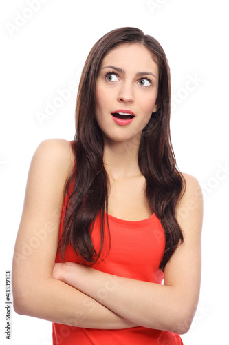 Photo: Surprised woman looking up Surprised woman looking up