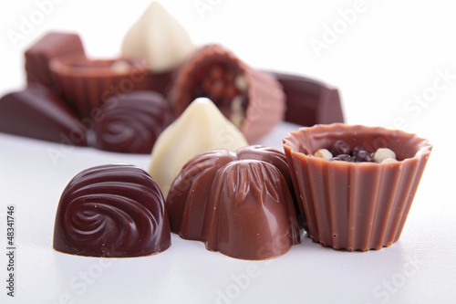 Photo: chocolates isolated on white chocolates isolated on white