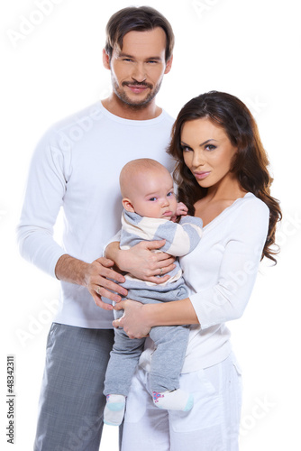 Photo: Happy beautiful young family Happy beautiful young family